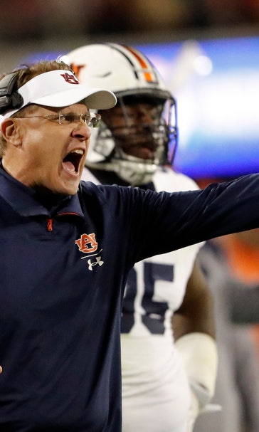 Auburn tries to regroup vs Liberty in between rivalry games